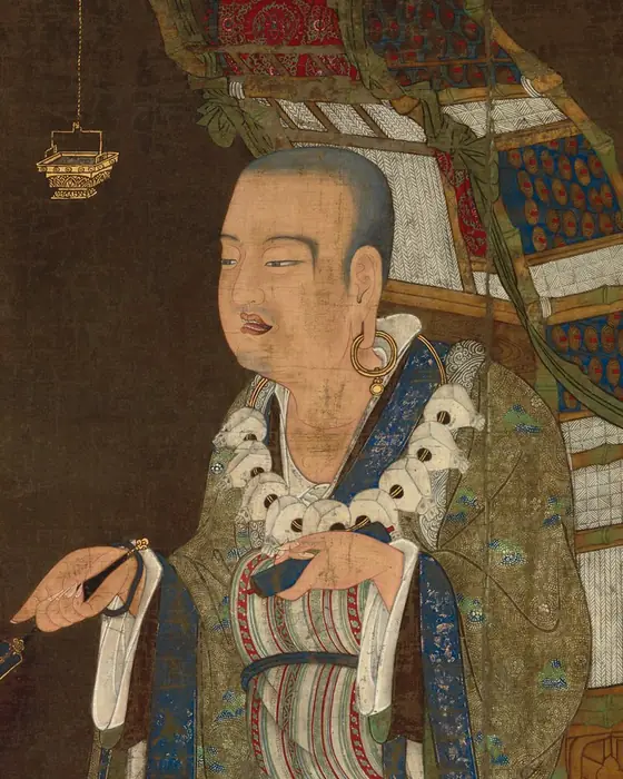 A painting of a walking monk in green and white robes, carrying a frame of scrolls on his back.